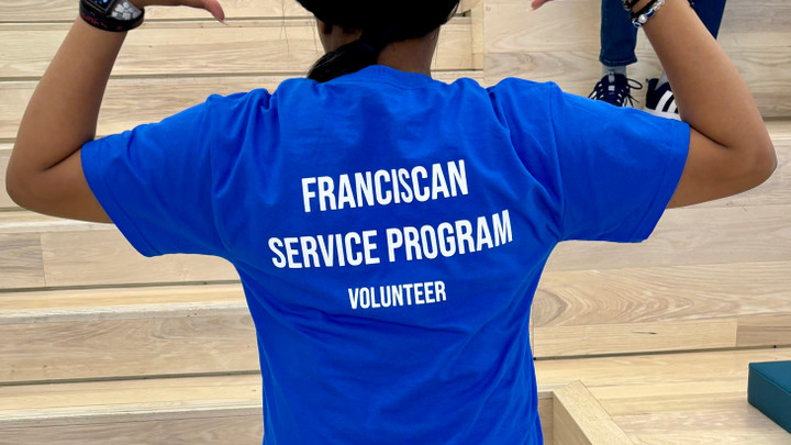 Franciscan Service Program Volunteer with FSP Shirts