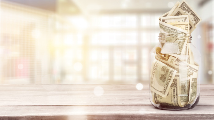 Glass jar money background