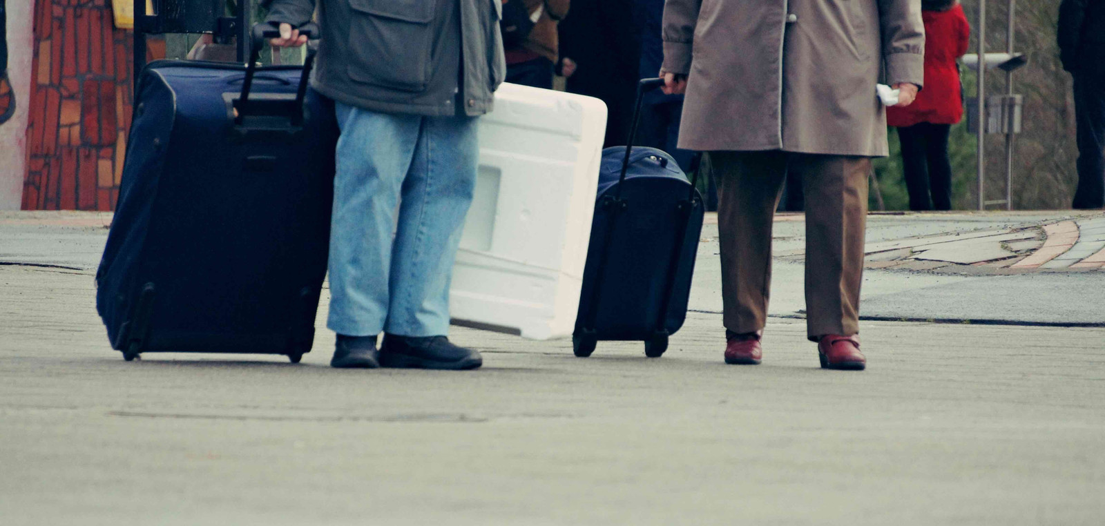 Low section people walking with luggage city